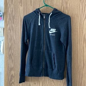 Nike woman’s hoodie. Grayish black. Size small